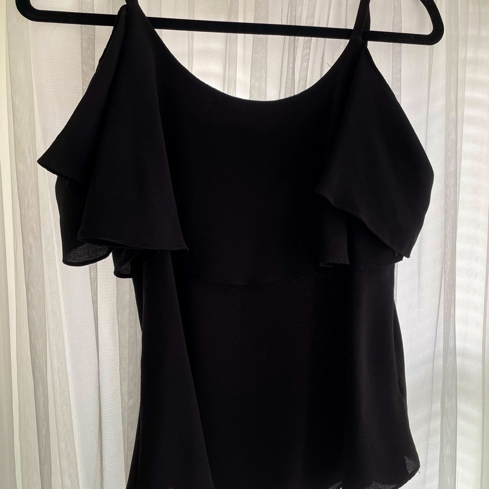Beautiful, layered black blouse with straps from bobeau